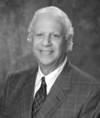 photo of John W. Meshad, Investment Partner of Harbinger Development, LLC
